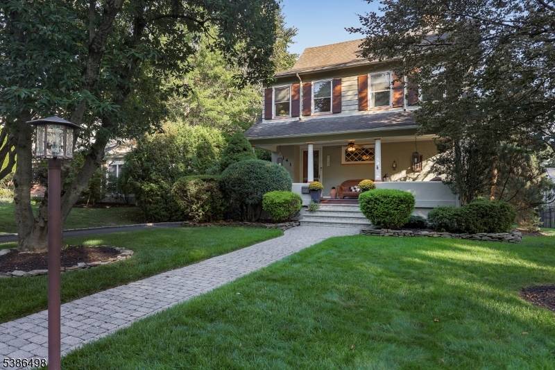 Built in 1909 and lovingly cared for, this timeless four level Colonial feels instantly welcoming.