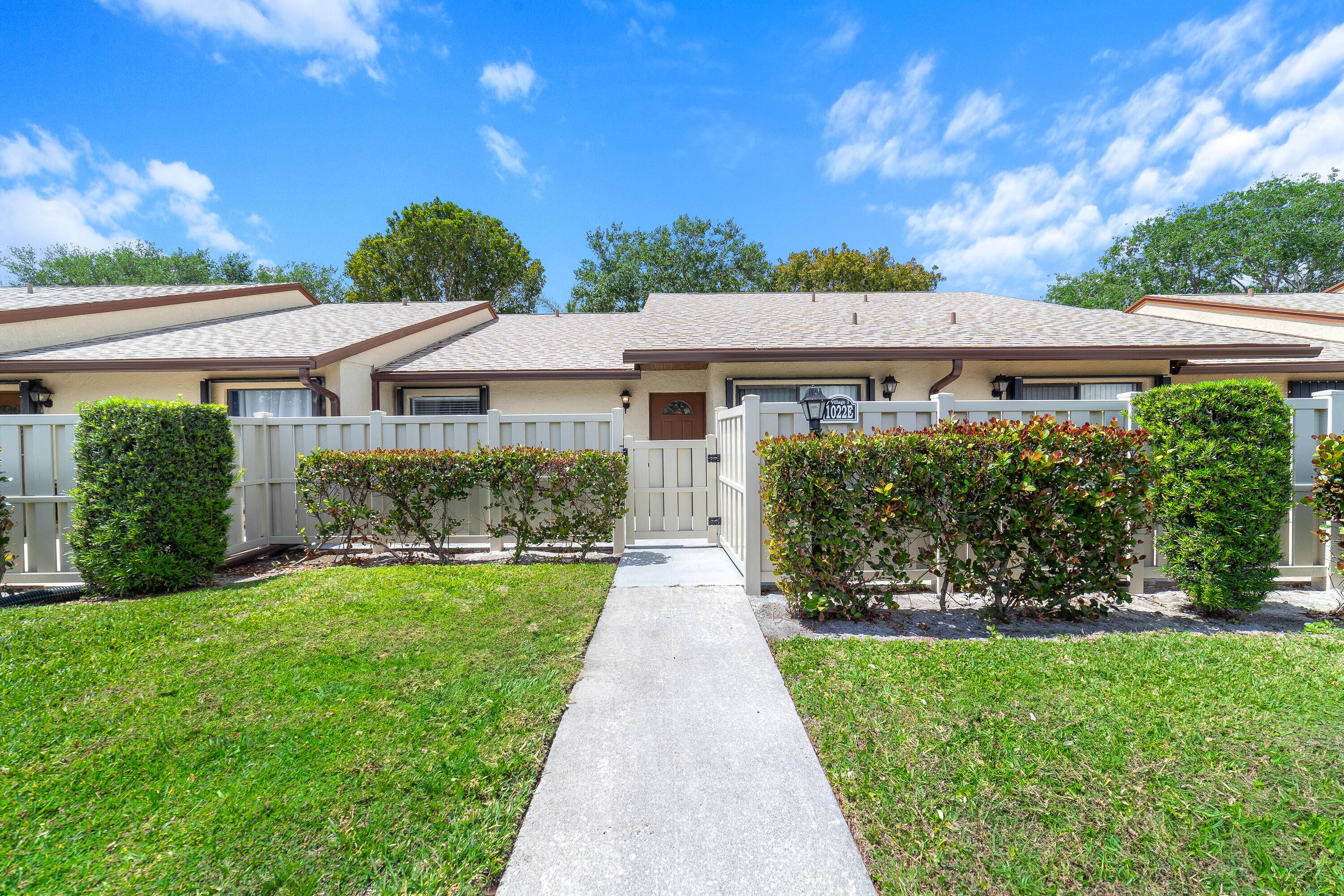 This beautiful and spacious 2 bedroom, 2 bathroom villa features a gorgeous serene lake view from the unit and a screened in, tiled and covered lanai.