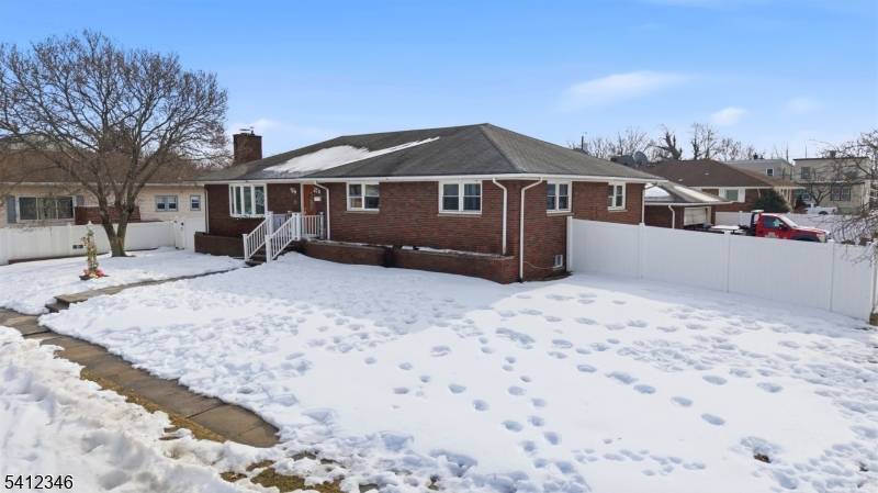 Stunning 4 bed, 2 full bath all brick ranch with a fully finished walkout basement ideal for Mother Daughter living.