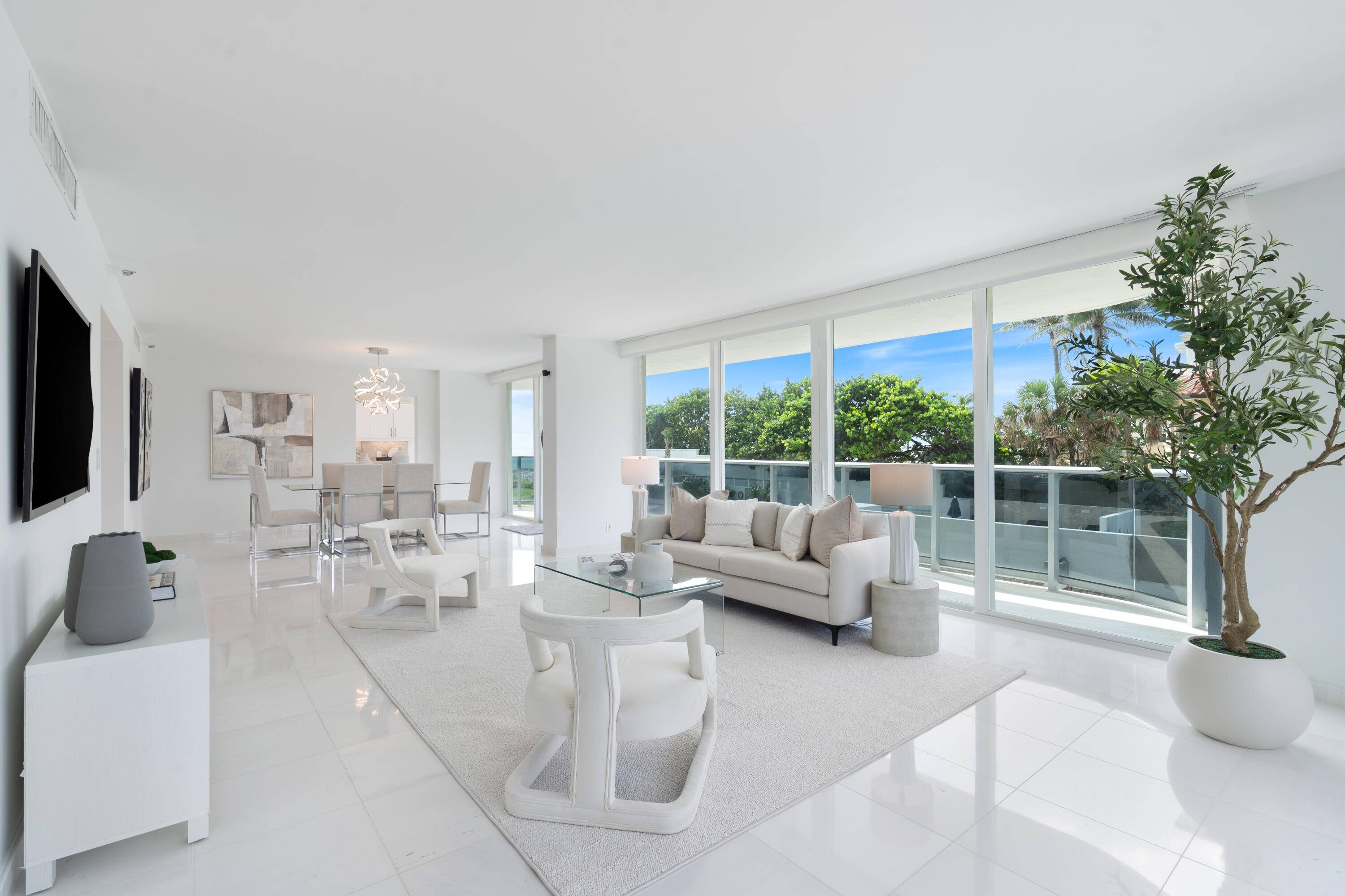 OCEANFRONT LOCATED MINUTES TO MIZNER PARK, GOLF, DINING SHOPPING, THIS RESIDENCE COMBINES COASTAL LIVING WITH UNMATCHED CONVENIENCE.