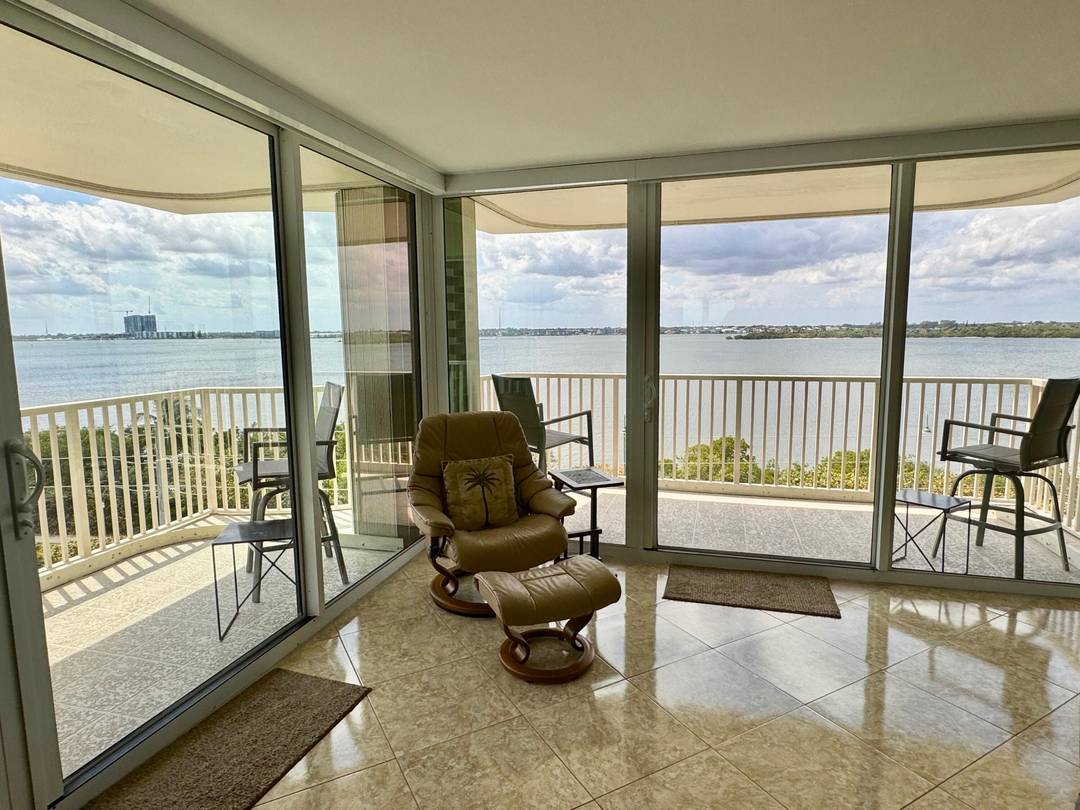 Lovely Season 2026 5th floor corner unit w panoramic Intracoastal sunset views, the reflection of city lights across the wide waterway.