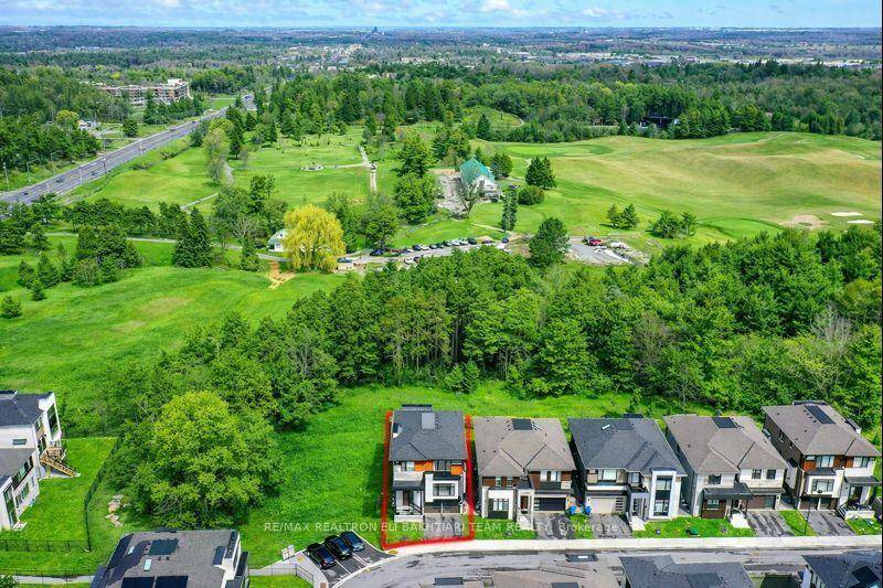 50 Royal Hill a beautifully upgraded residence backing onto a breathtaking RANINE, offering rare privacy, natural beauty, and an exceptional lifestyle setting.