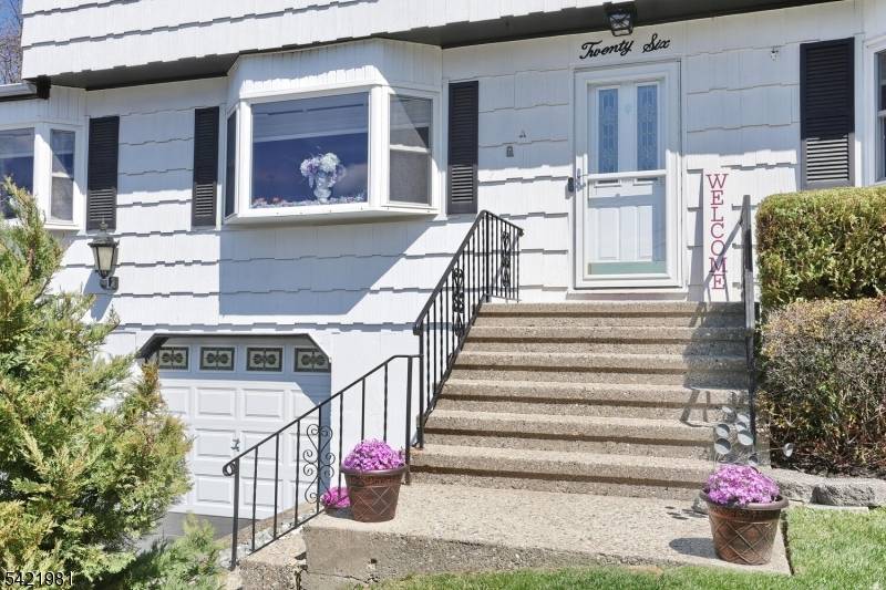 Welcome to this tastefully updated, well maintained 4 bedroom, 2.