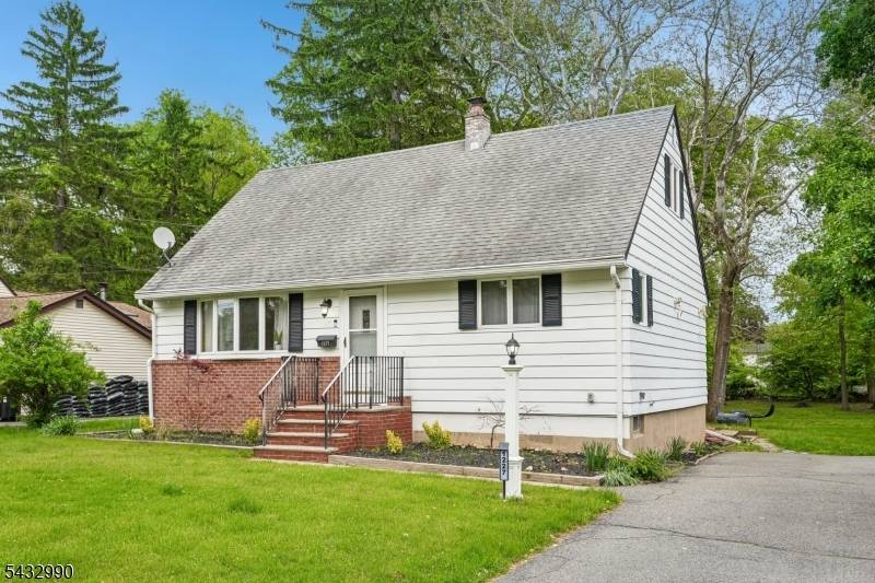 Welcome home to this beautifully maintained and thoughtfully updated 4 bedroom 2 bathroom Cape Cod nestled on a wooded lot, offering the perfect blend of comfort, style, and everyday functionality.