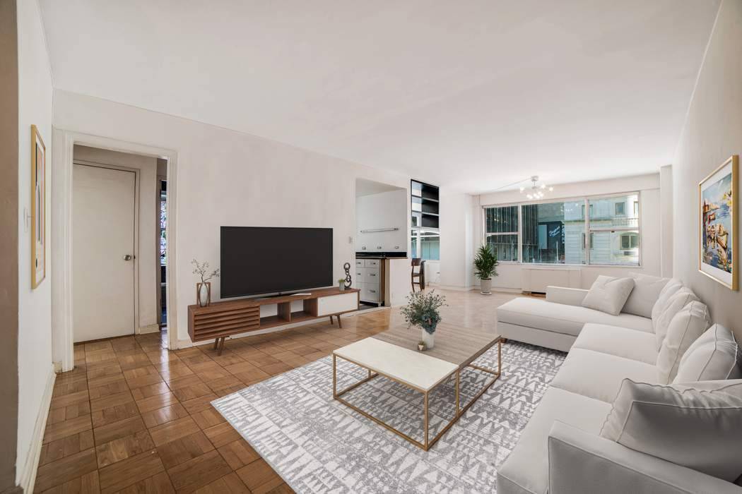 Experience the pinnacle of Midtown living in this expansive, meticulously designed 1 bedroom condominium, which can easily be converted into a two bedroom sanctuary.