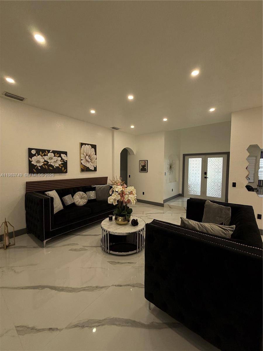 Step into refined living with this beautifully upgraded 4 bedroom, 3 bathroom recently remodeled residence, designed for comfort, elegance, and effortless indoor outdoor living.