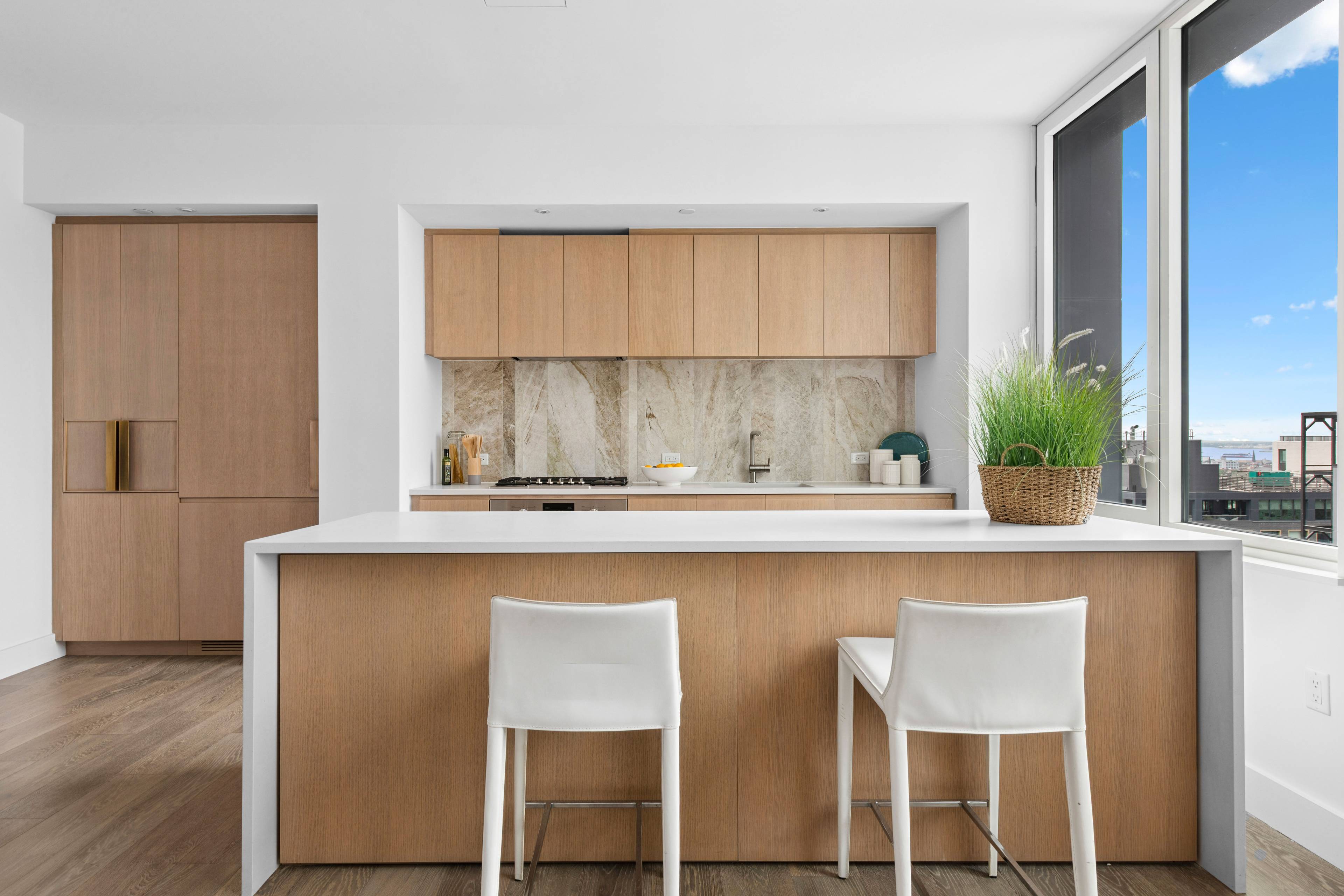 Perched high above Brooklyn, this two bedroom, two bath penthouse combines elevated design with sweeping city views.