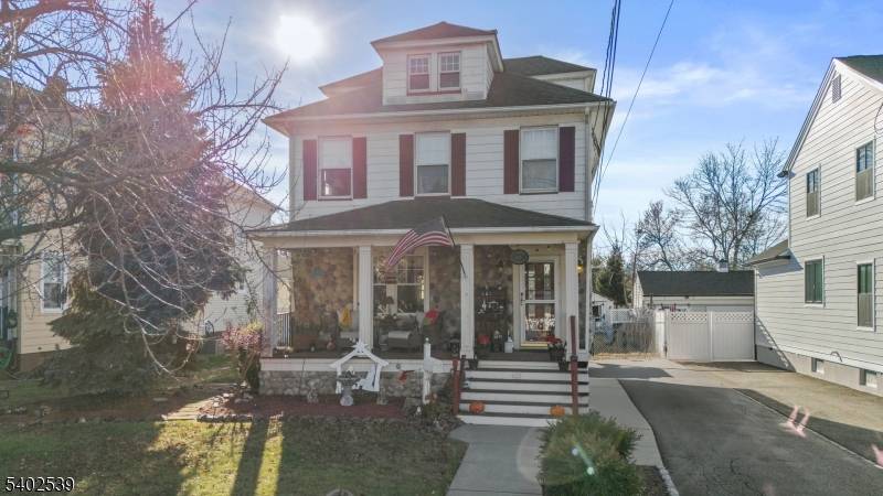 Charming Colonial with Beautiful Front Porch, This home has charm, Kitchen with a Butlers pantry, All season room off the dining room, Laundry chute, walk up attic great for storage ...