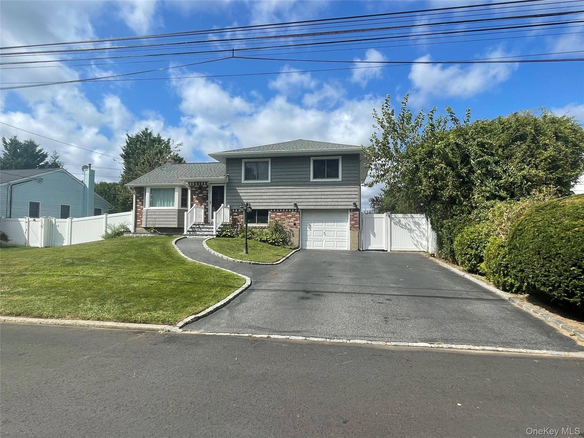 Welcome to this beautiful renovated spacious 5 bedroom 2 full bath Split Level Home, perfect for extended families or those seeking flexible living arrangements mother daughter with permit.