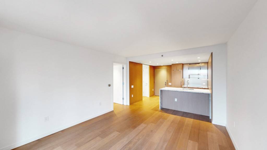 This elegant 698 sq ft residence, with design by Thomas Juul Hansen, boasts a bright and open one bedroom, one bathroom layout.
