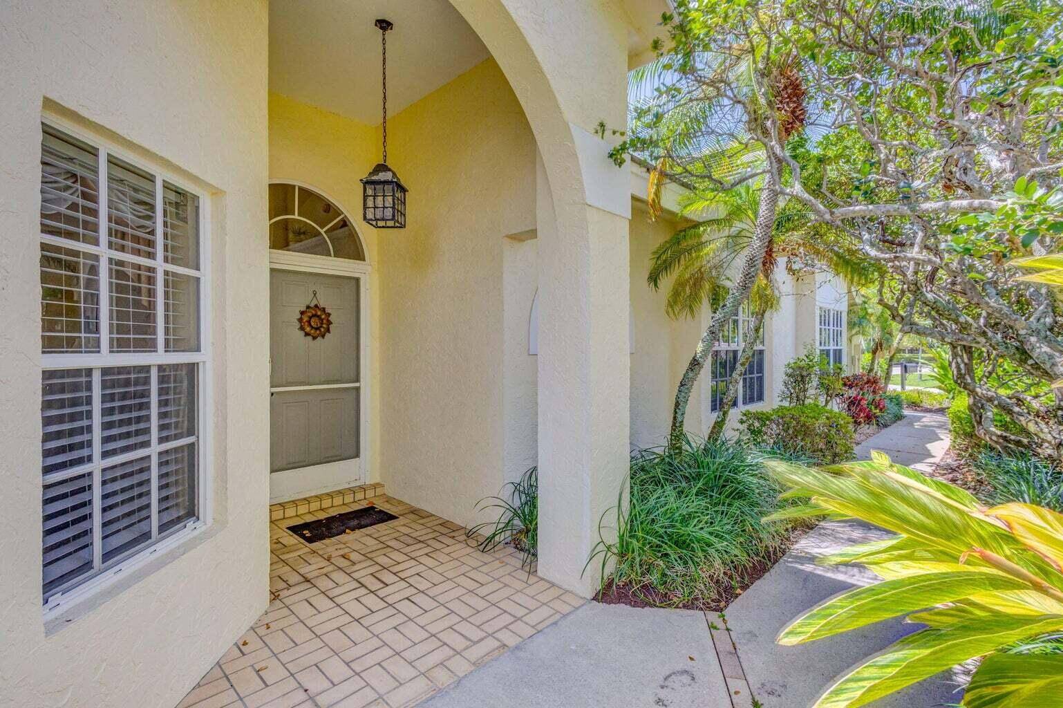 Discover your dream home in the sought after neighborhood of Riverwind, a gated enclave within the prestigious Jonathan's Landing community.