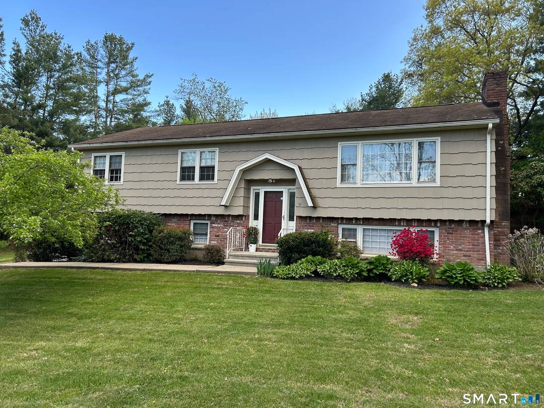 Great possibilities await with this large Raised Ranch !