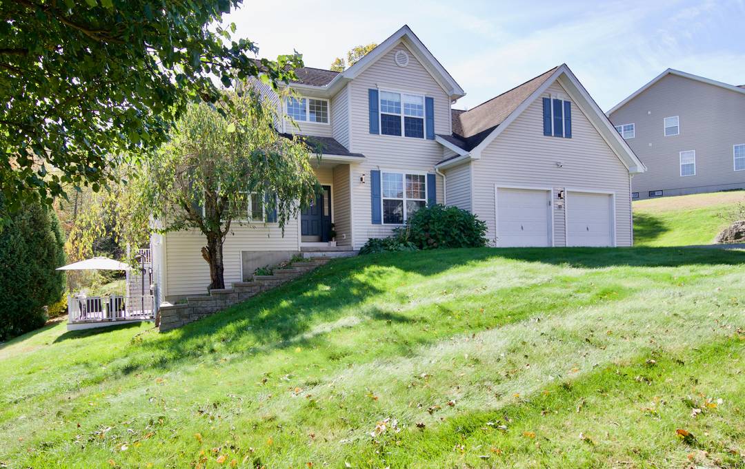 Beautifully maintained Colonial style home built in 2002, located in the desirable Hillandale neighborhood.