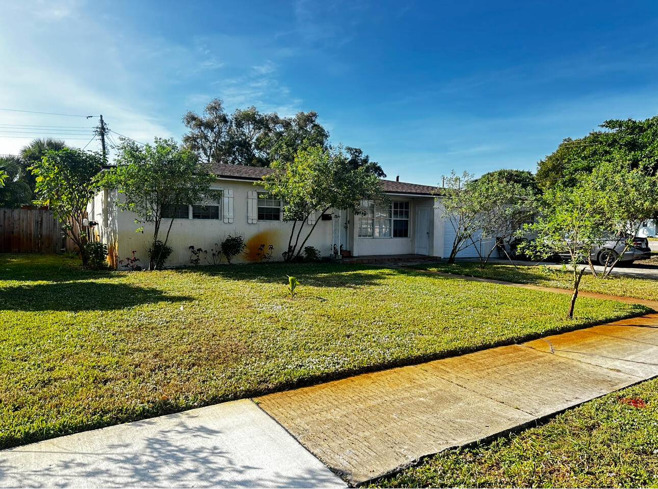 Charming CBS construction home, New Roof, New AC Unit, legal 4 bedroom, 2 full bath, 1 car garage.