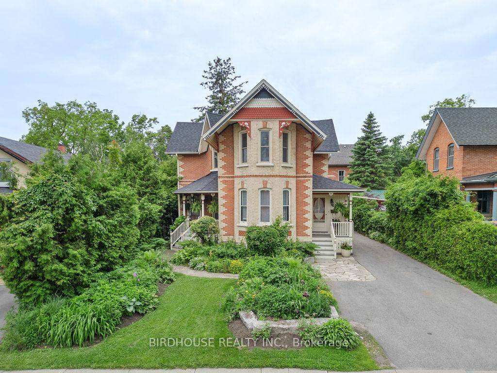 Meticulously maintained and tastefully updated century home near downtown Lindsay !