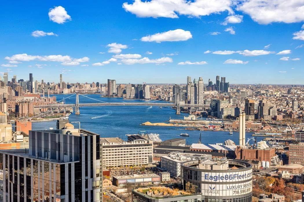 STUNNING VIEWS, 5 STAR AMENITIES AND THE LAST 25 YEAR TAX ABATEMENT Rarely available, residence 48A is a mint condition 2 bedroom, 2 bath corner home facing West and North, ...