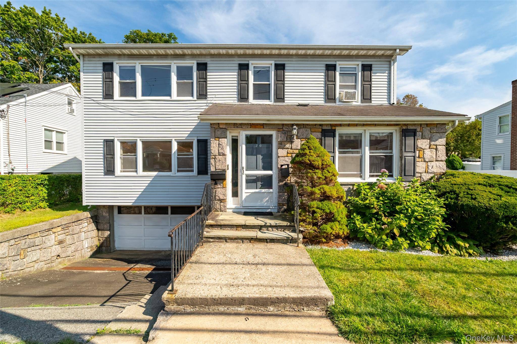 Welcome to 20 S. Stone Avenue a well maintained two family home in the heart of Elmsford !