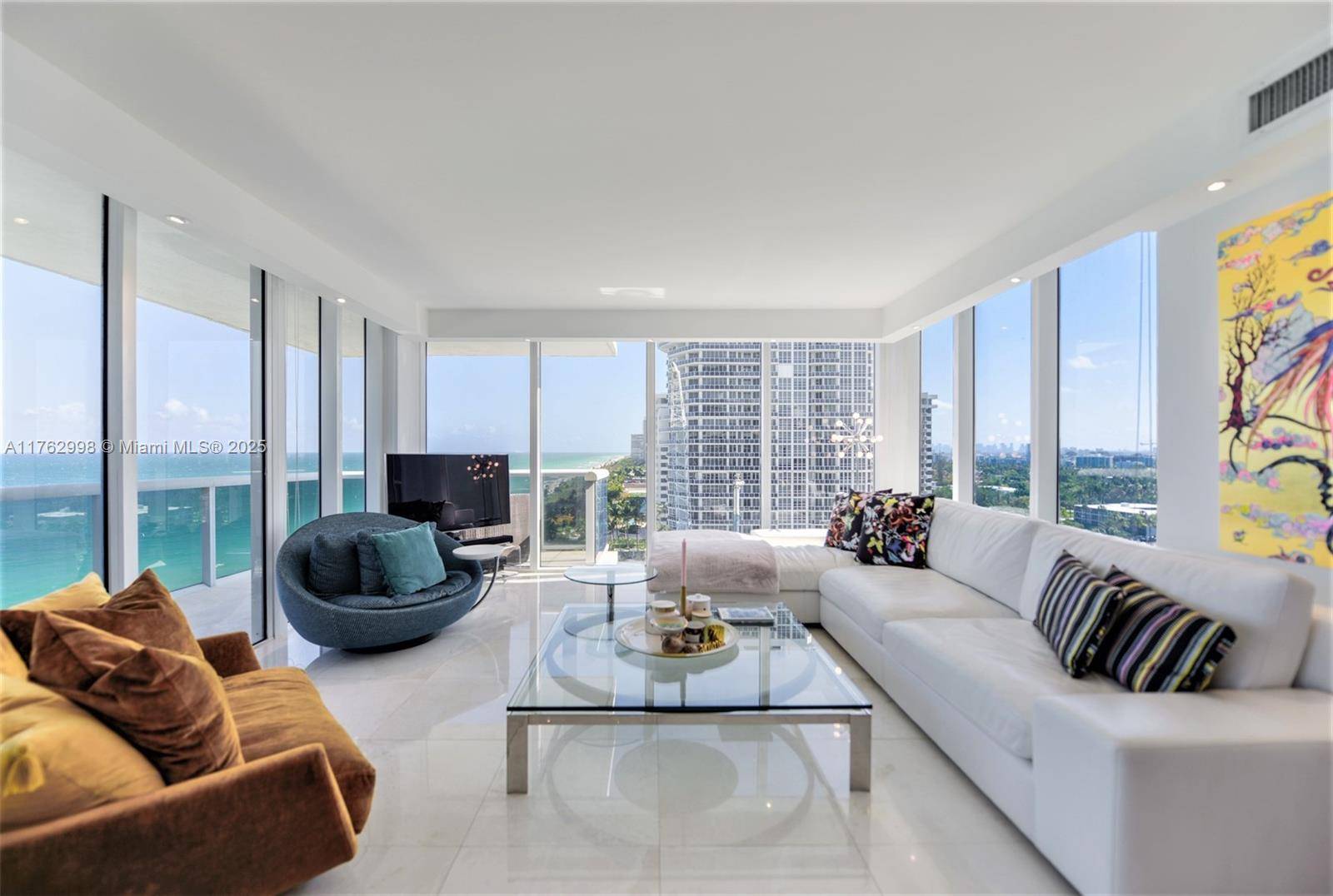 Experience resort style oceanfront living in this rare wraparound 2BR 2BA corner residence with east south west exposure and breathtaking views of the Atlantic, pool, and Miami Beach skyline.