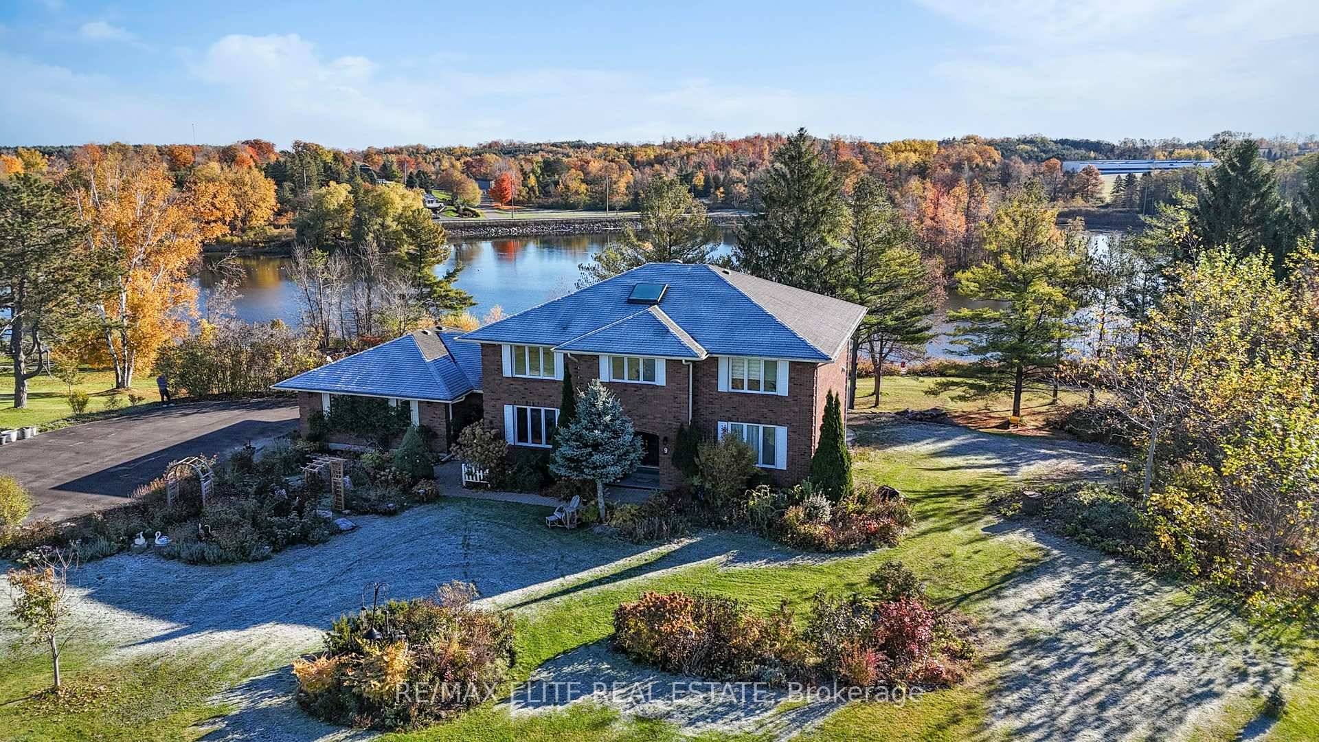 Welcome to this stunning waterfront home nestled in a serene and picturesque community, sitting on approximately 1.