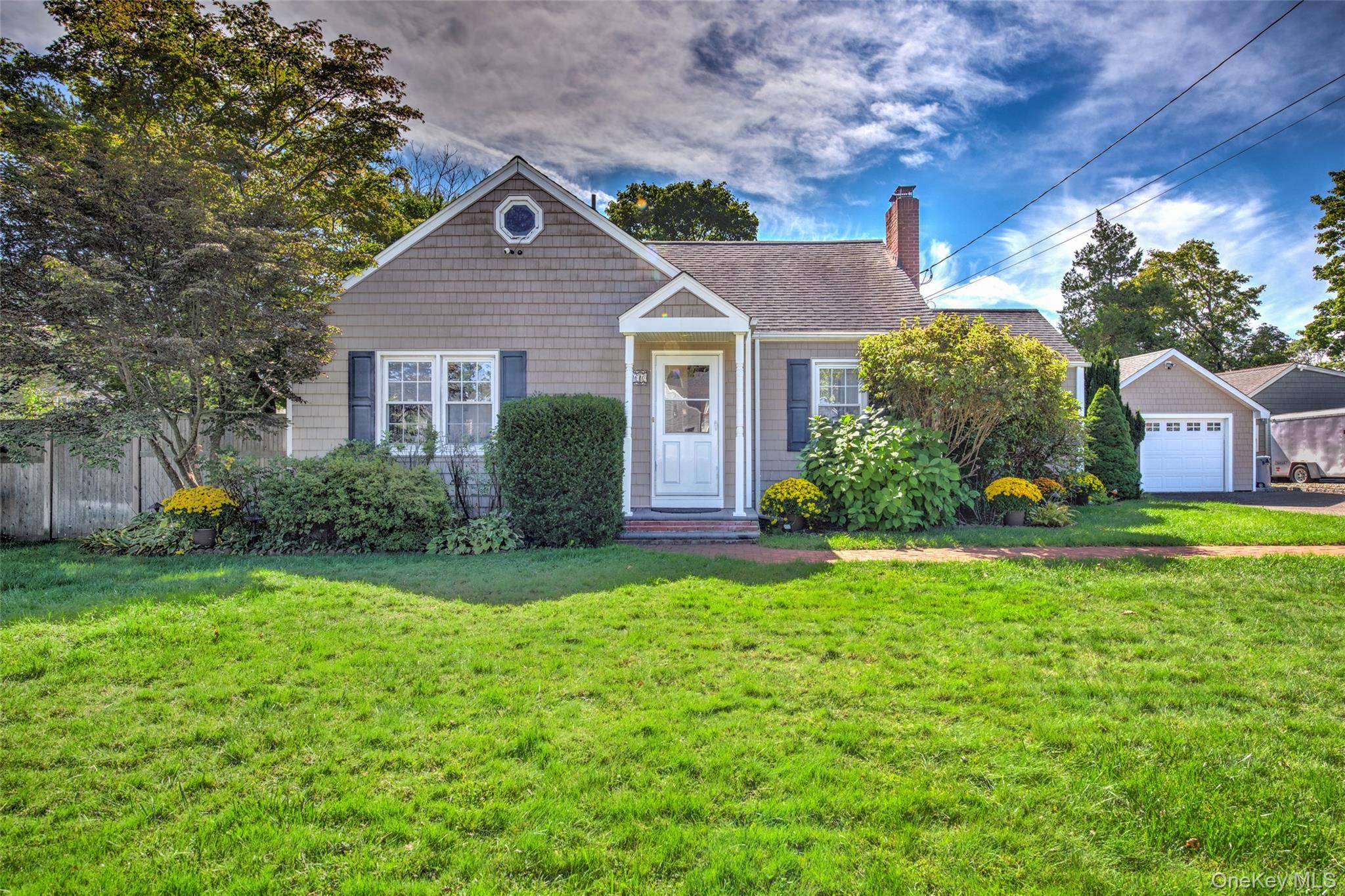 Surrounded by a park like setting, this well cared for home presents four bedrooms, two full baths and a layout designed for everyday ease.