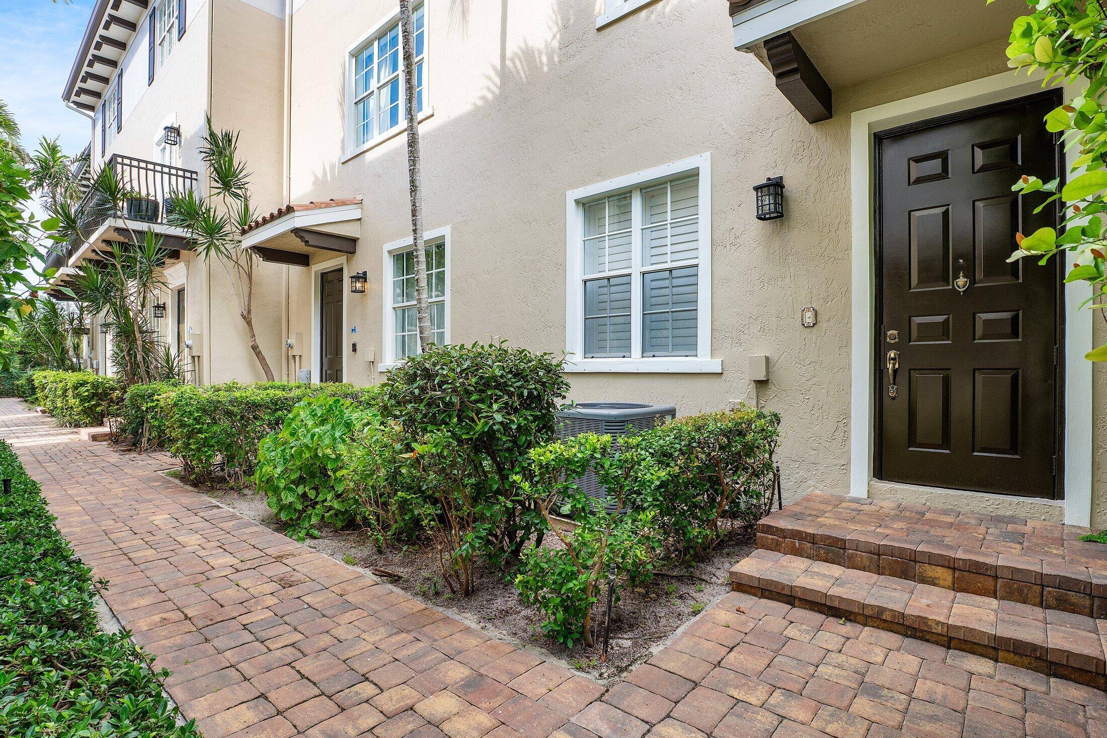 This 3 story townhome in downtown Delray Beach is the perfect blend of convenience and beach side living.