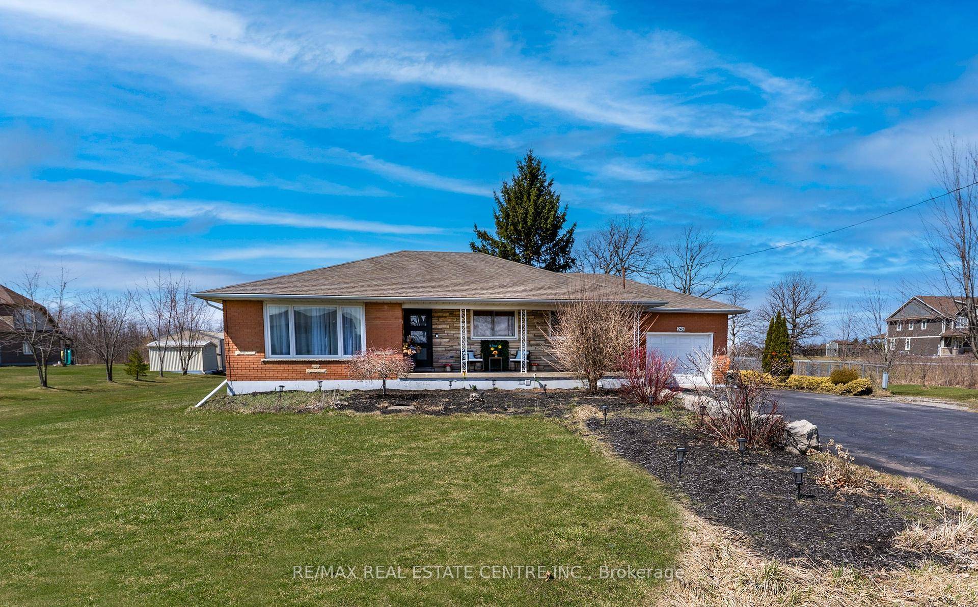 This beautifully 5 bedroom bungalow sits on a 1.