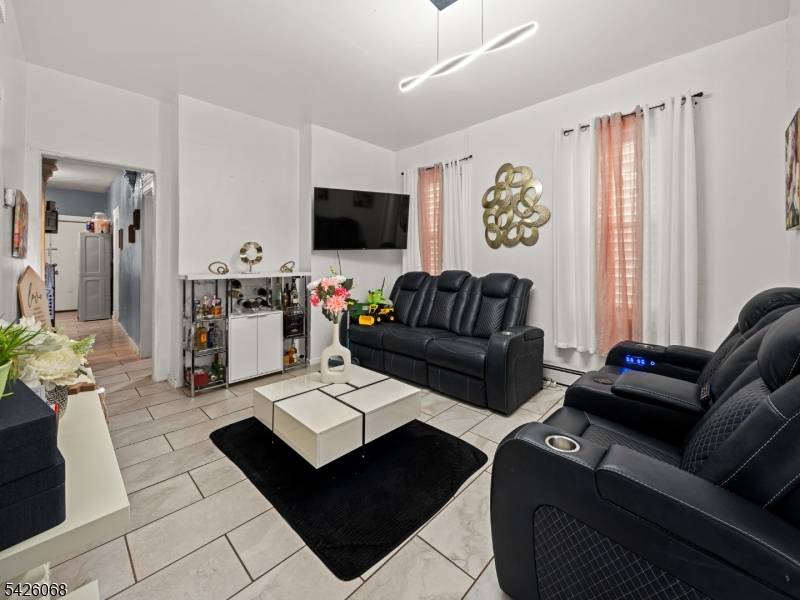 Well maintained 3 family property offering strong income potential in a convenient Paterson location.