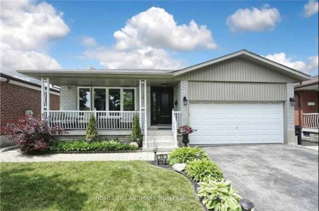 Large and bright basement room featuring a fireplace, creating a warm and inviting living space.