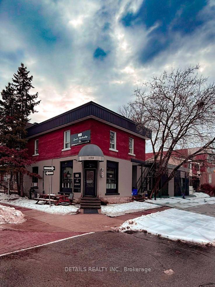 Exceptional mixed use fourplex prominently positioned on the corner of Cooper and Percy in the heart of high demand Centretown.