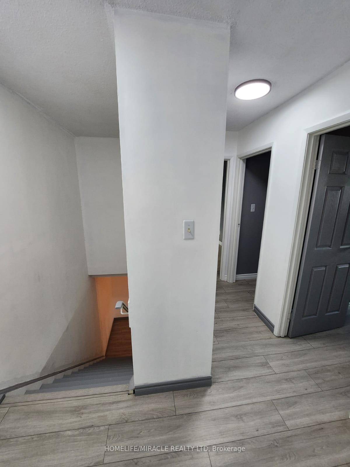 Welcome to 1100 Oxford Street, Unit 2 a beautifully maintained condo that perfectly blends comfort, convenience, and modern living with new flooring.