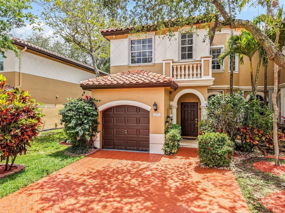 Well maintained corner unit in the gated community of Bellagio at Vizcaya.