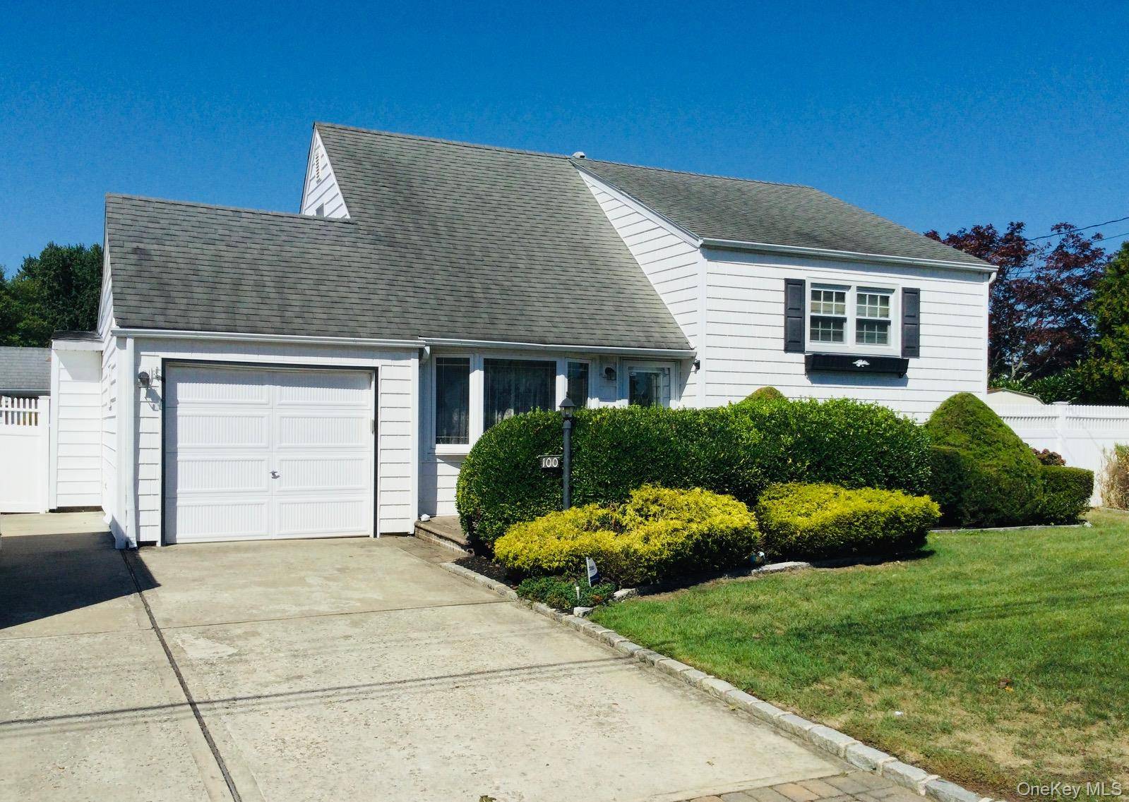 Ideally located split level home featuring 3 bedrooms, a full bath, living room, dining room, eat in kitchen, den, family room, and a separate laundry room with a convenient laundry ...