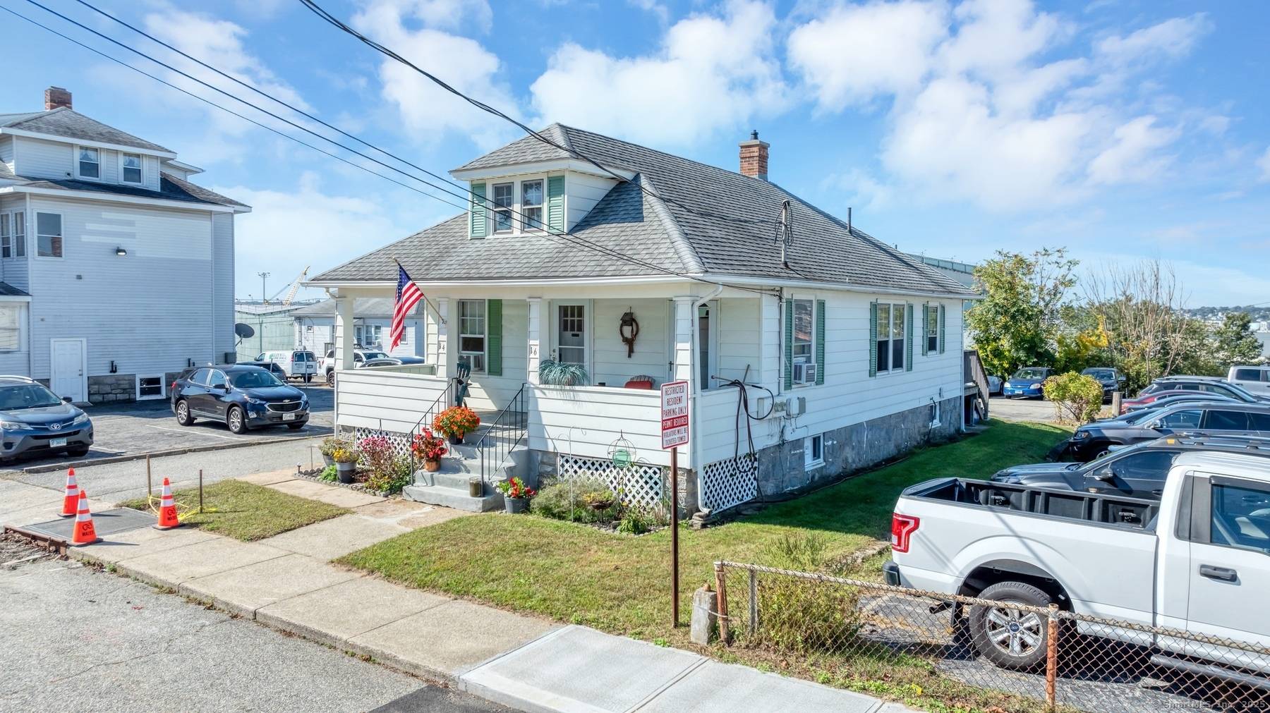Exceptional multifamily investment opportunity boasting a rare 25 space private parking lot ideally located within walking distance to Electric boat.
