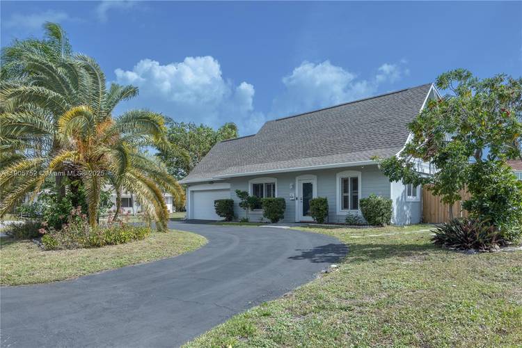 Offered AS IS, this spacious 5 bedroom, 3 bathroom residence has been successfully operated as a short term rental for over a decade, generating repeat guests and consistent demand.