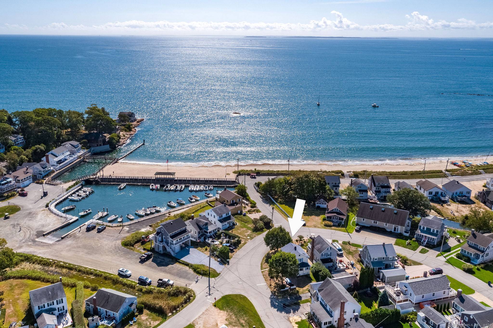 If you're drawn to the timeless charm of the classic beach lifestyle, this Point O' Woods property embodies it completely.