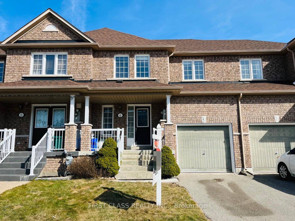 Gorgeous Freehold Townhouse In A Highly Demanded Family Neighborhood.