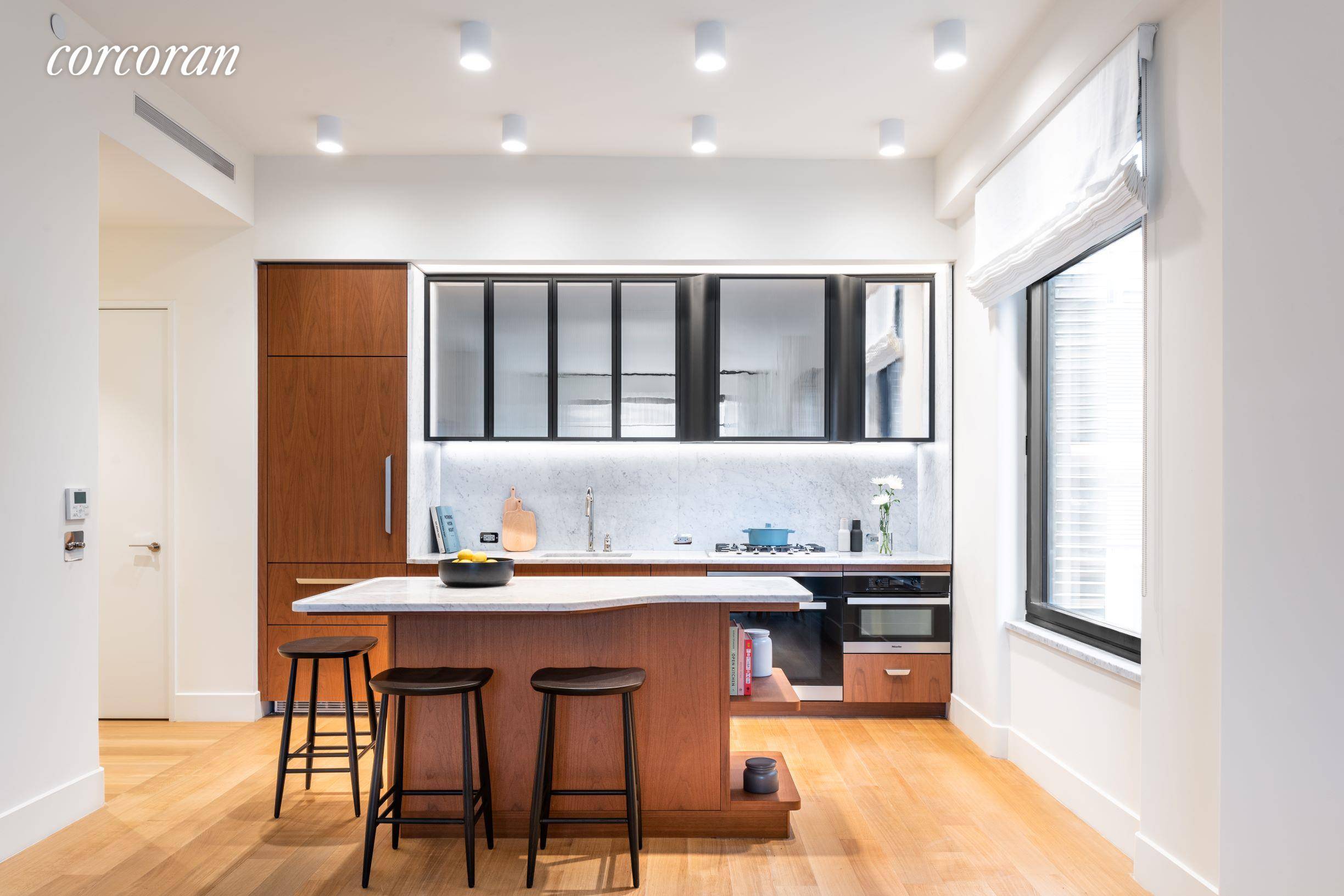Residence 17J at 110 Charlton Street is a corner two bedroom two bathroom condominium home with both South and East exposures.