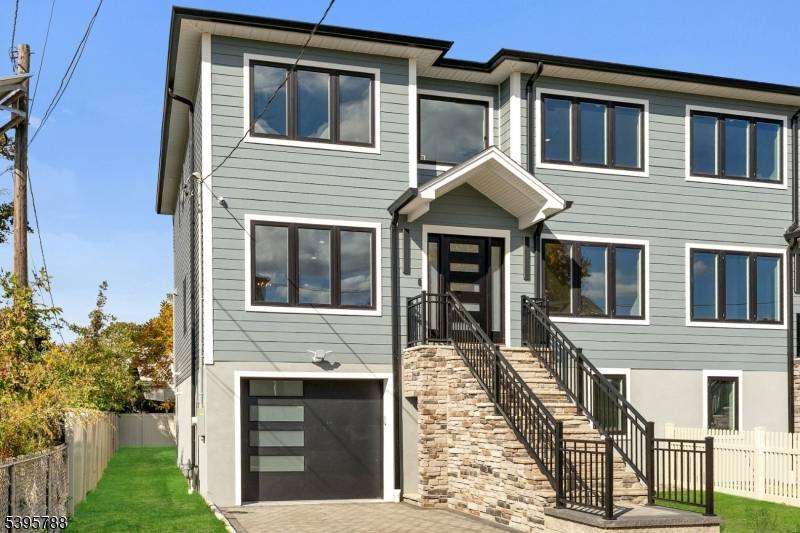 Brand New East facing 8 bedroom, 6 full bath 2 family duplex w 2 separate garages driveways !