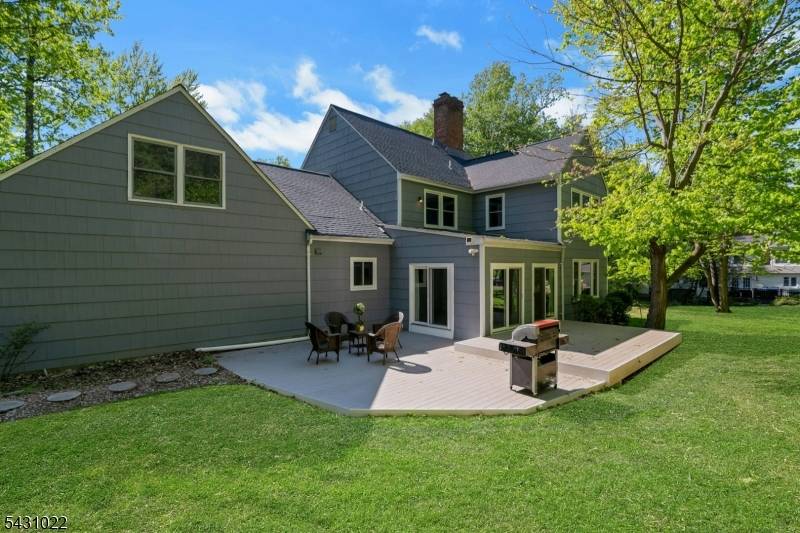 Welcome to 22 Sandalwood Drive, ideally situated on a beautiful street in one of Warren Township's most desirable neighborhoods.