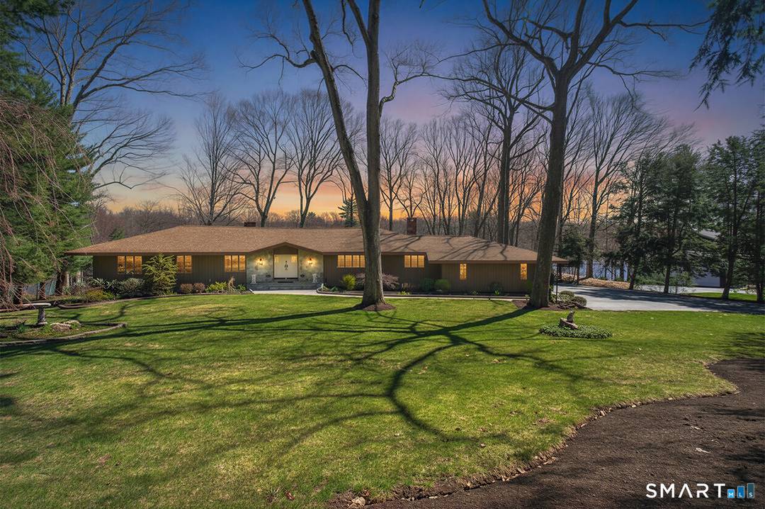 A rare waterfront estate in prestigious Canoe Brook Lake, this exceptional property offers the ultimate luxury living with its own private island, charming footbridge, and sandy beach, perfect for swimming, ...