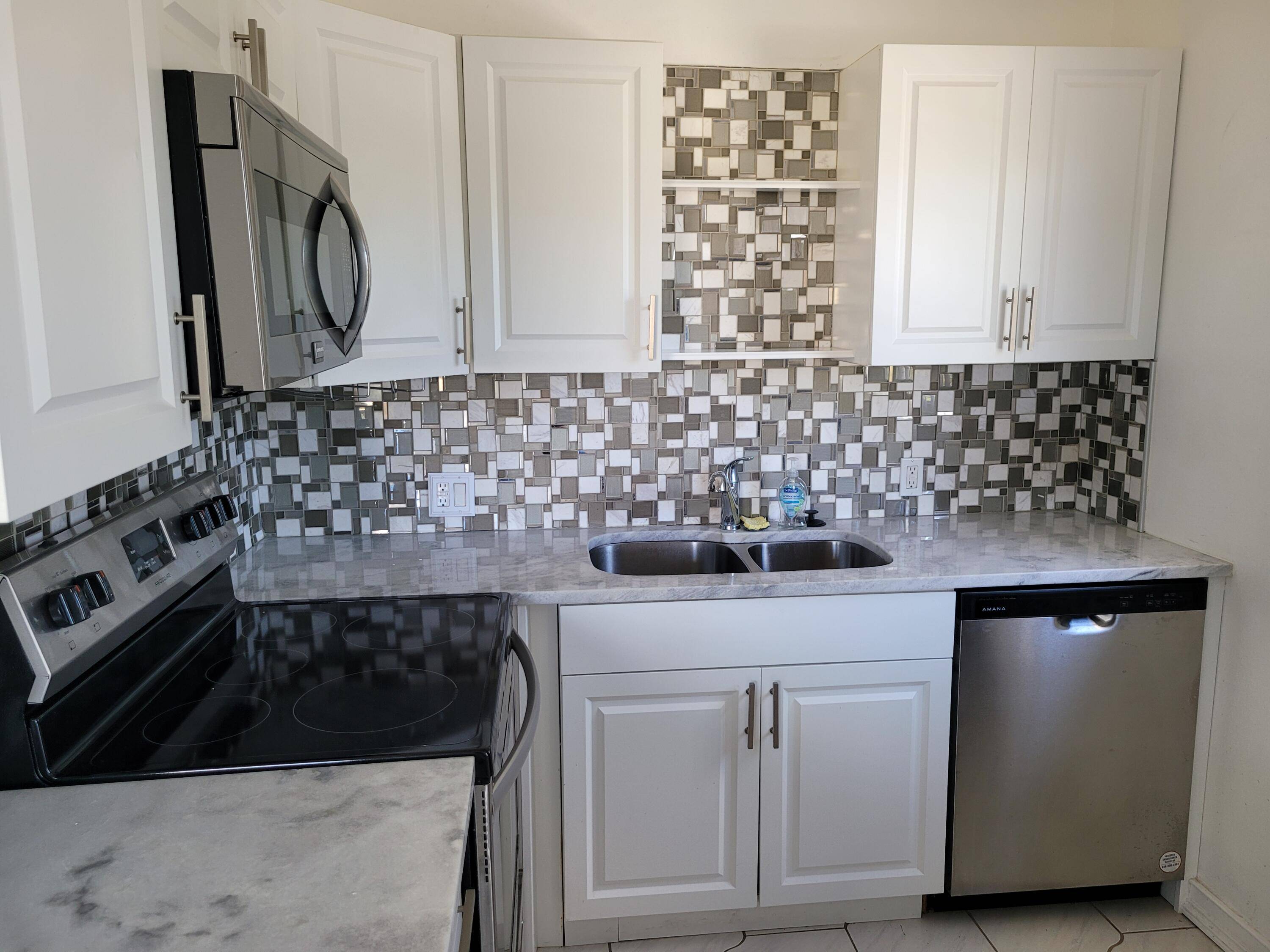 Beautifully updated 2 bedroom end unit with extra natural light from side windows in Breakfast Room, Kitchen, Bath and 2nd Bedroom.