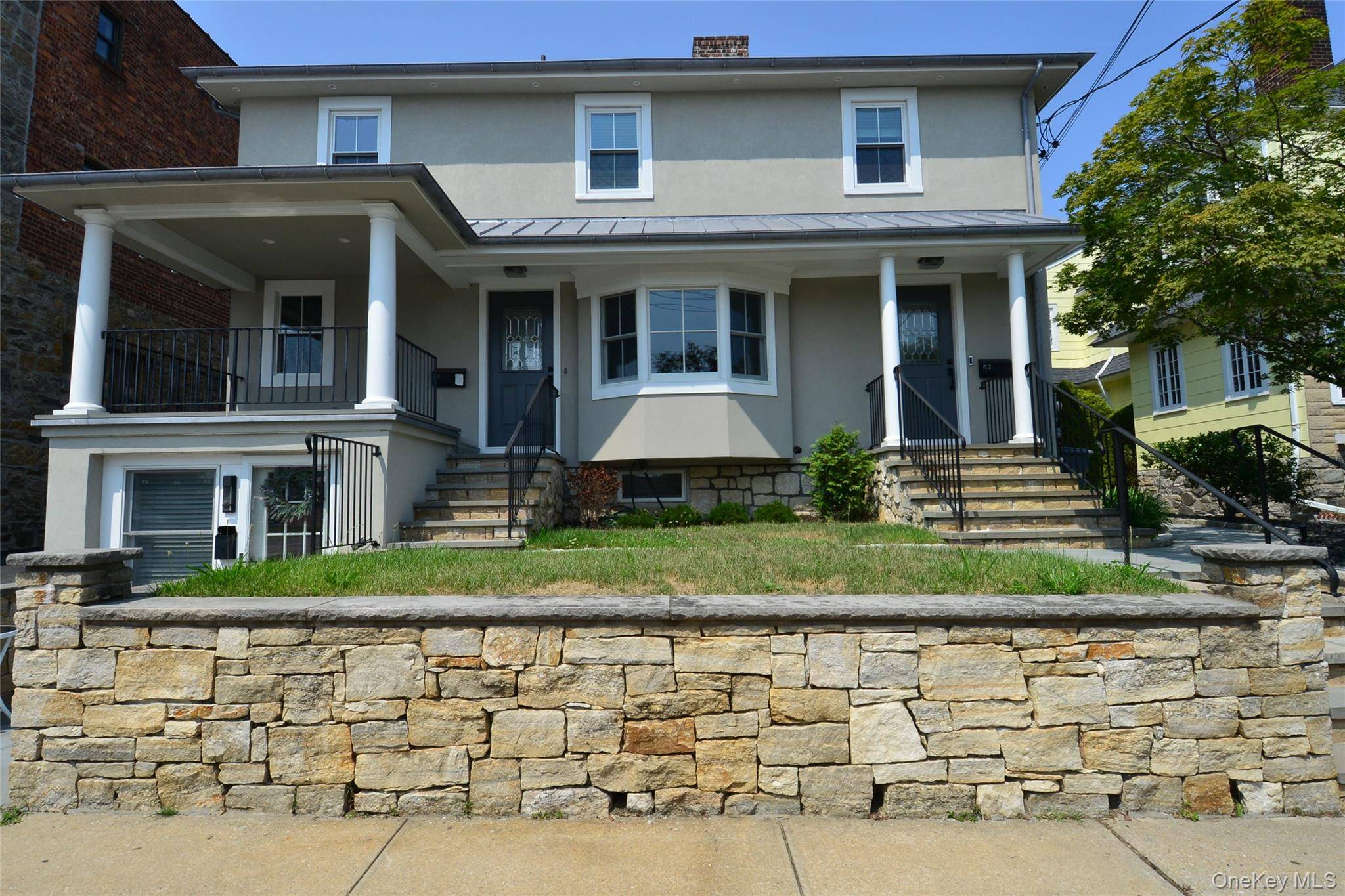 Legal three family home in prime Eastchester location, completely rebuilt from the ground up with brand new poured foundation, all new plumbing and electric, and high end interior renovations throughout.