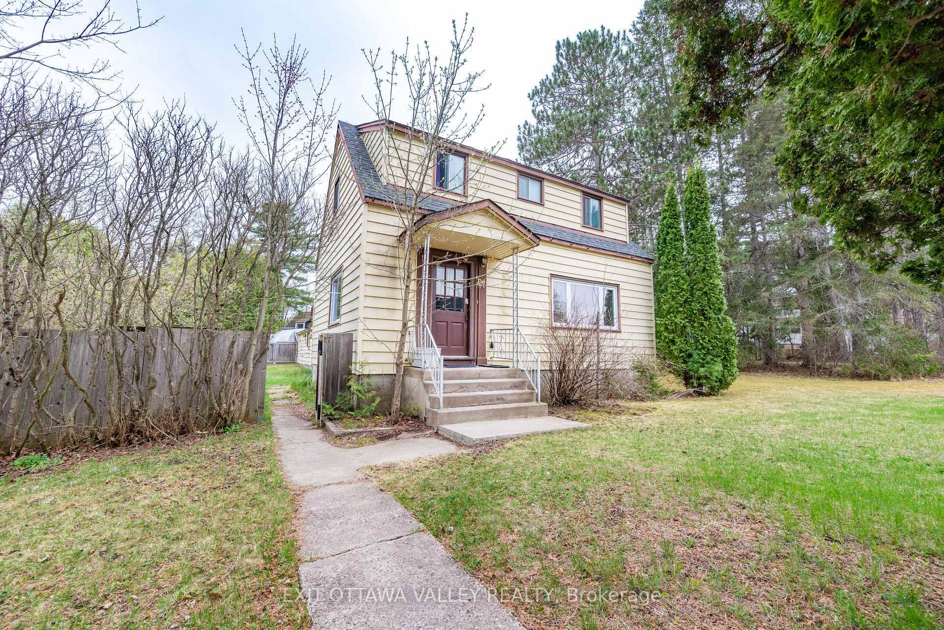 Nestled on a spacious corner lot, this move in ready 1.