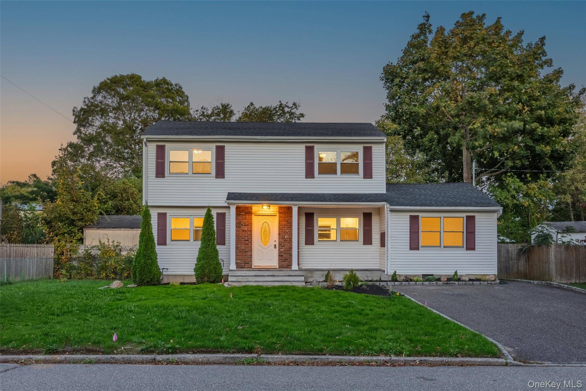 Welcome to 31 Colony Rd A Turnkey Gem in the Heart of Port Jefferson Station !