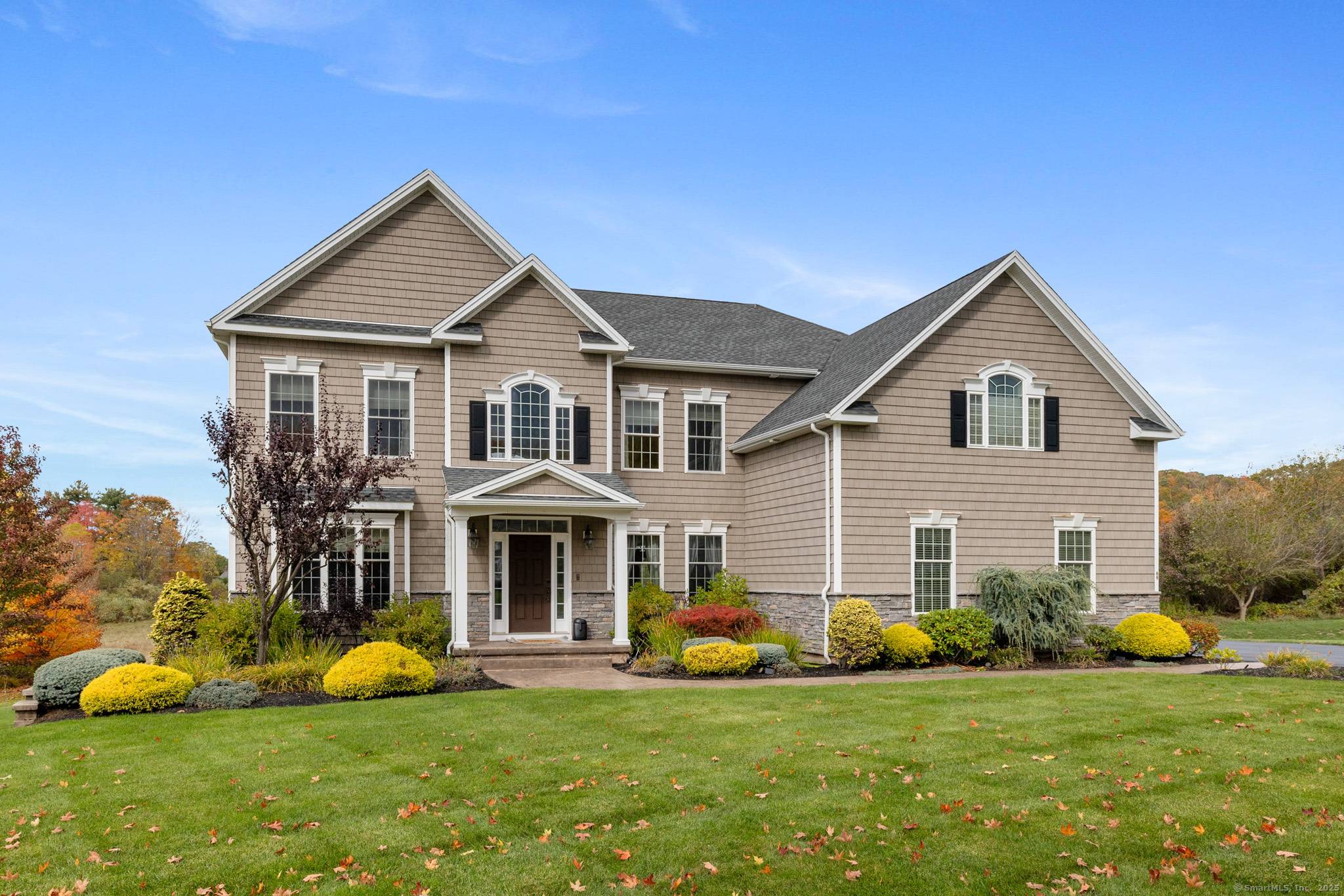 Why build when this 12 year young custom colonial is completely move in ready.