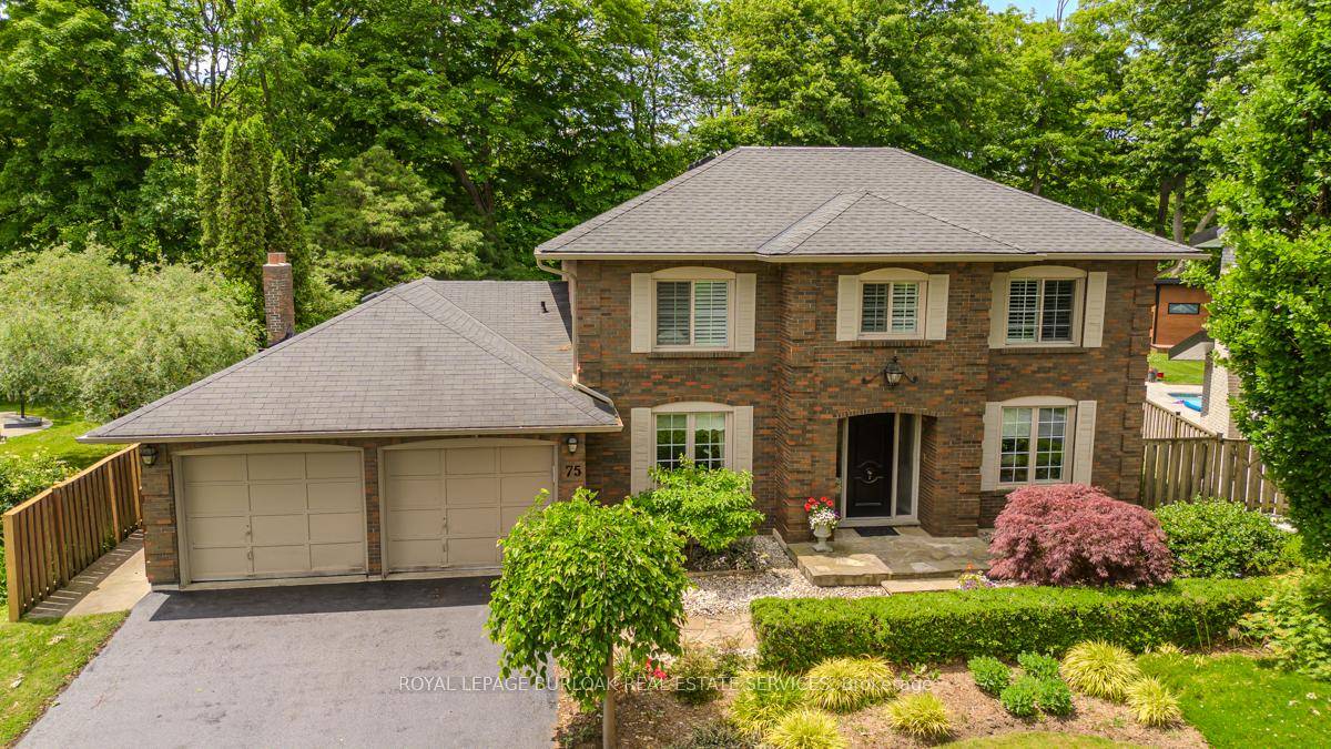 Welcome to a rare offering on one of the most desirable streets in Dundas an exceptional family home backing directly onto a lush ravine, with over 4, 000sqft of total ...