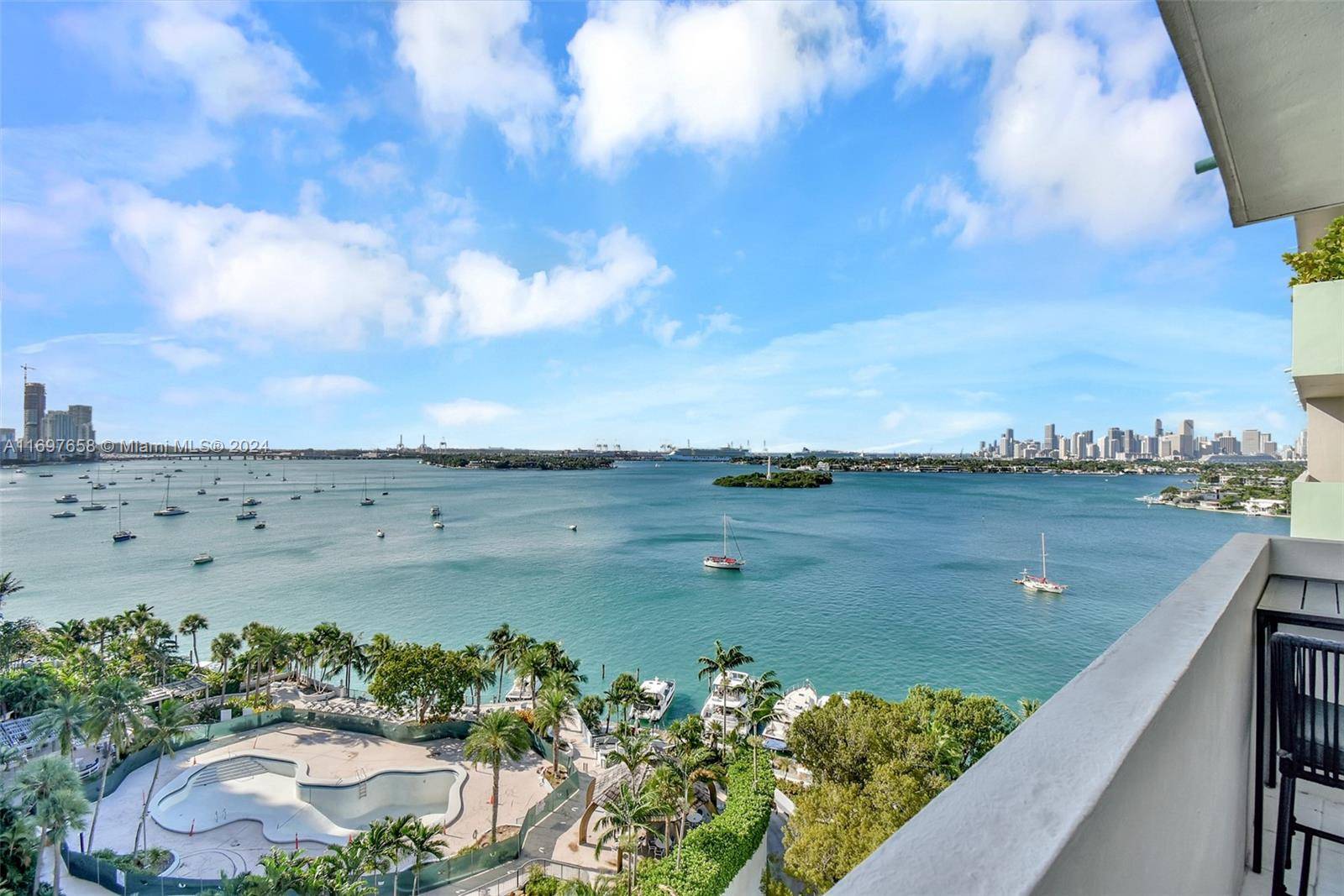 Indulge in breathtaking bay and city views from this completely renovated, spacious 1 bedroom sanctuary nestled in the center of Belle Isle.