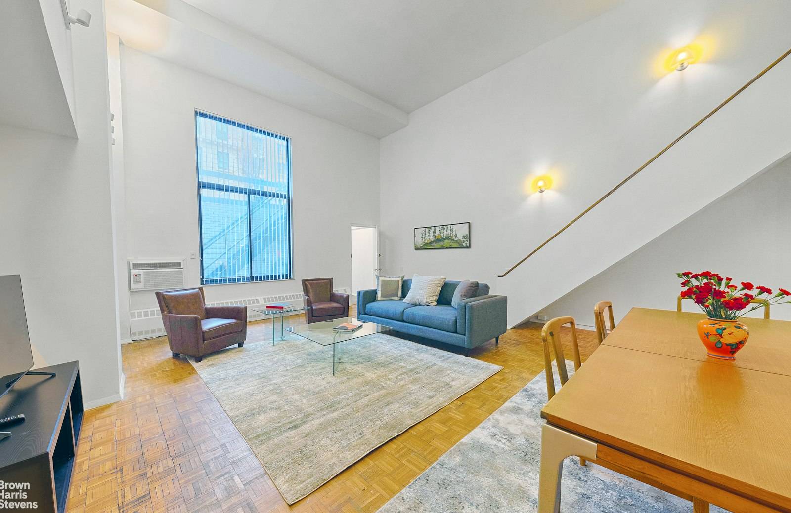 Five and a half room, 1, 769 Square foot Chelsea triplex with soaring 14 foot ceilings !