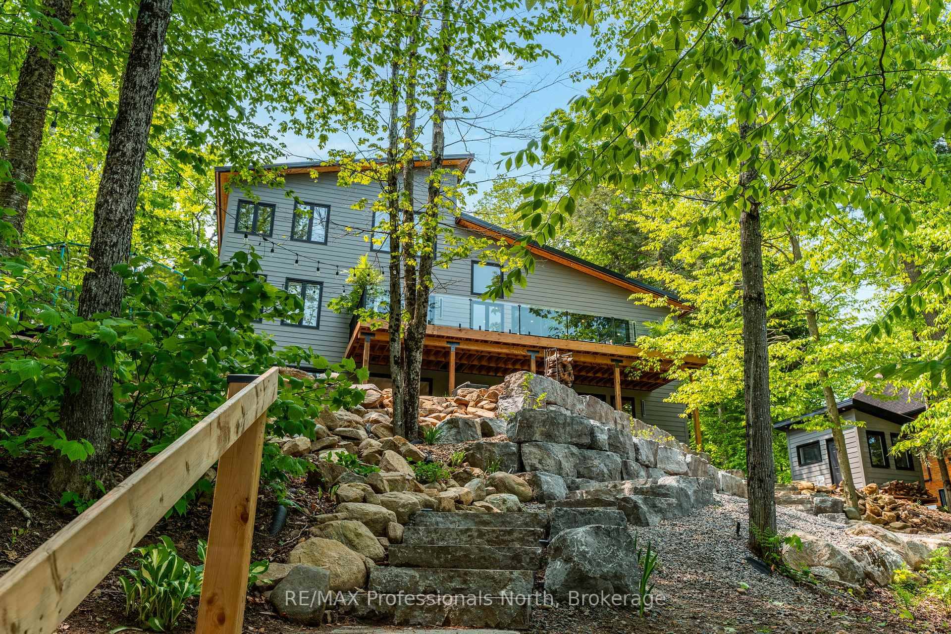 Welcome to 1063 Mink Rd, an extraordinary, year round contemporary waterfront home on the shores of Long Lake, part of a pristine two lake chain in beautiful Haliburton County.