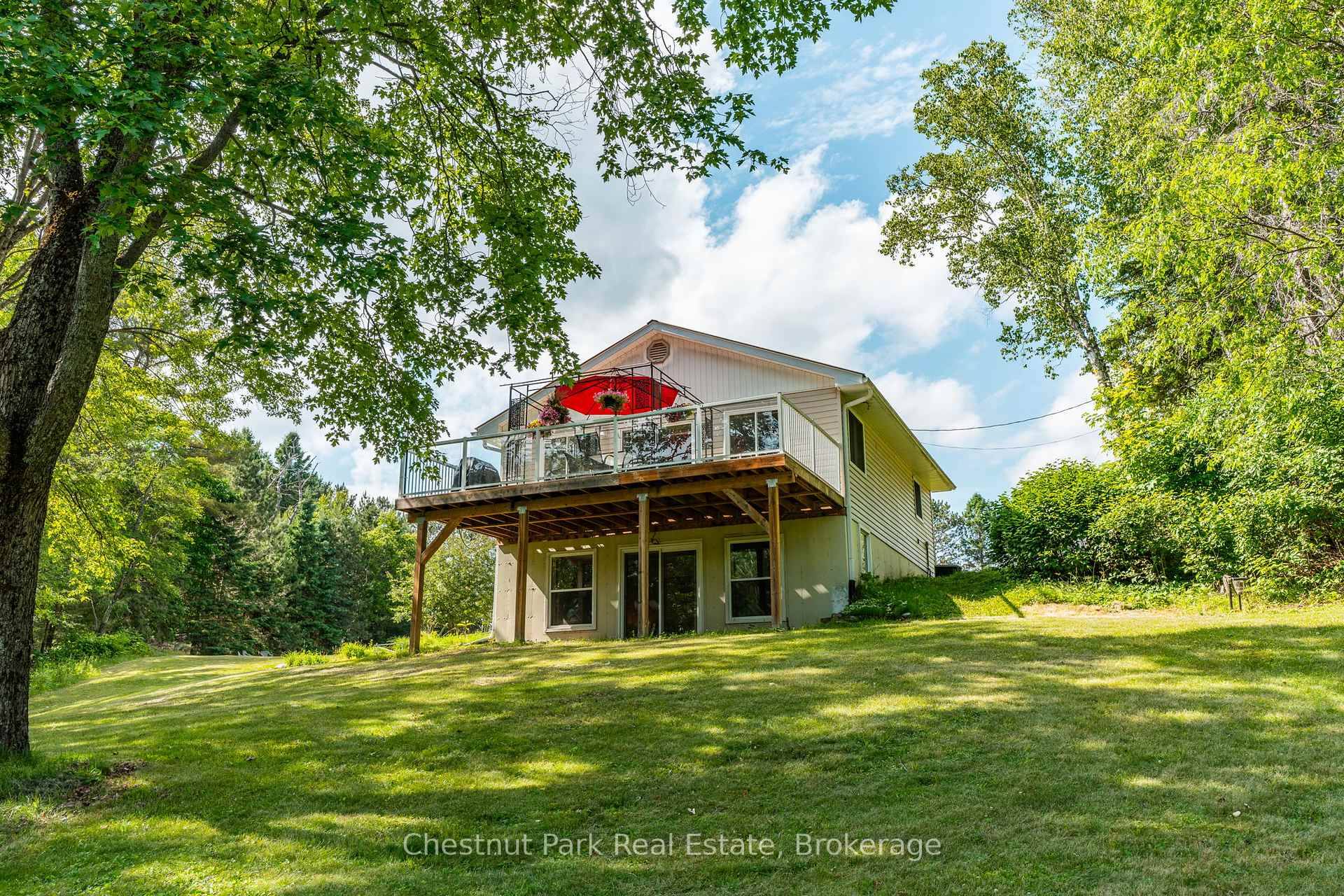 Escape to this serene waterfront property on the Gull River, offering access to Maple, Grass, and Pine Lakes.